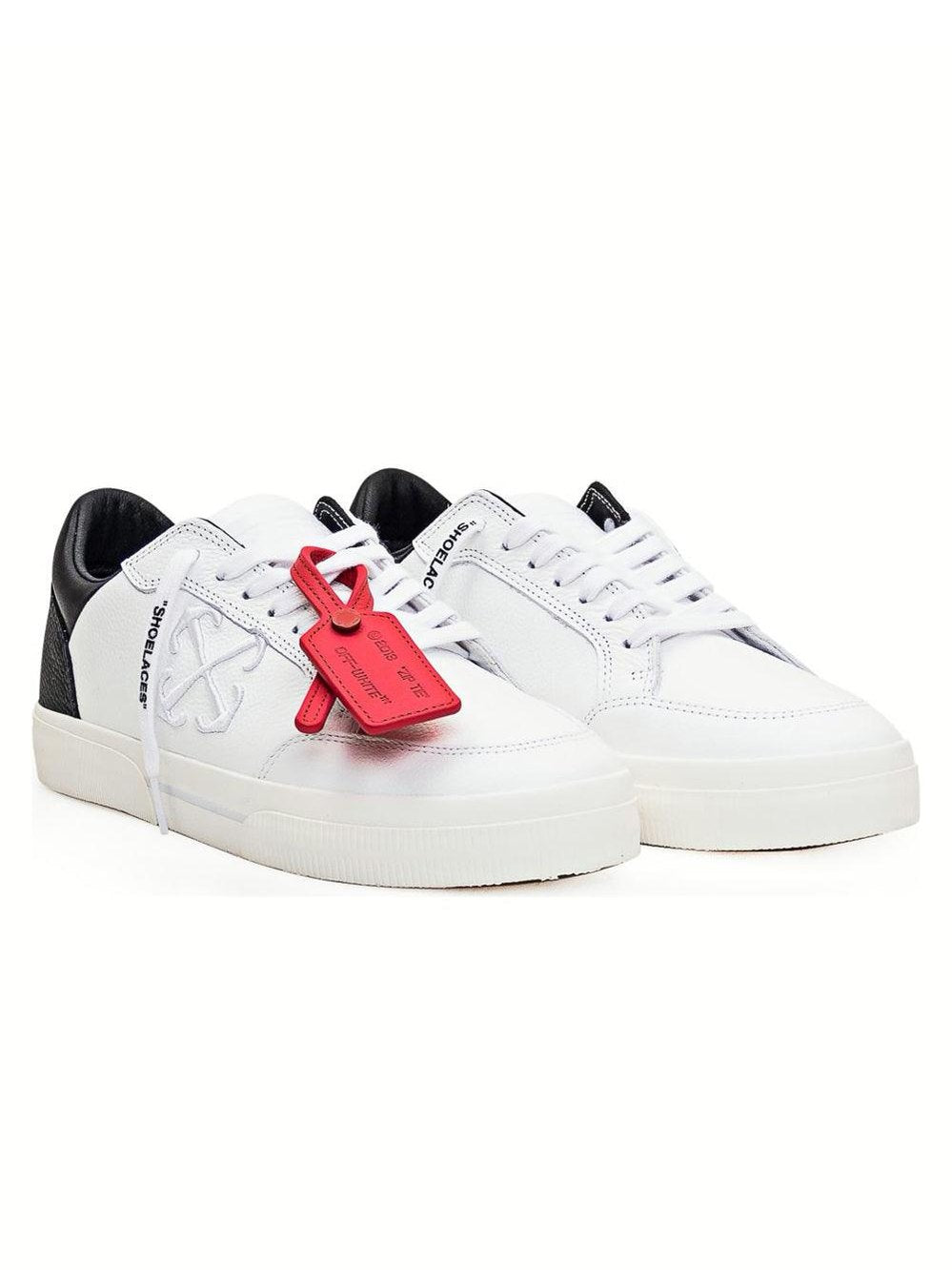 Off-white low-top vulcanized leather snakers
