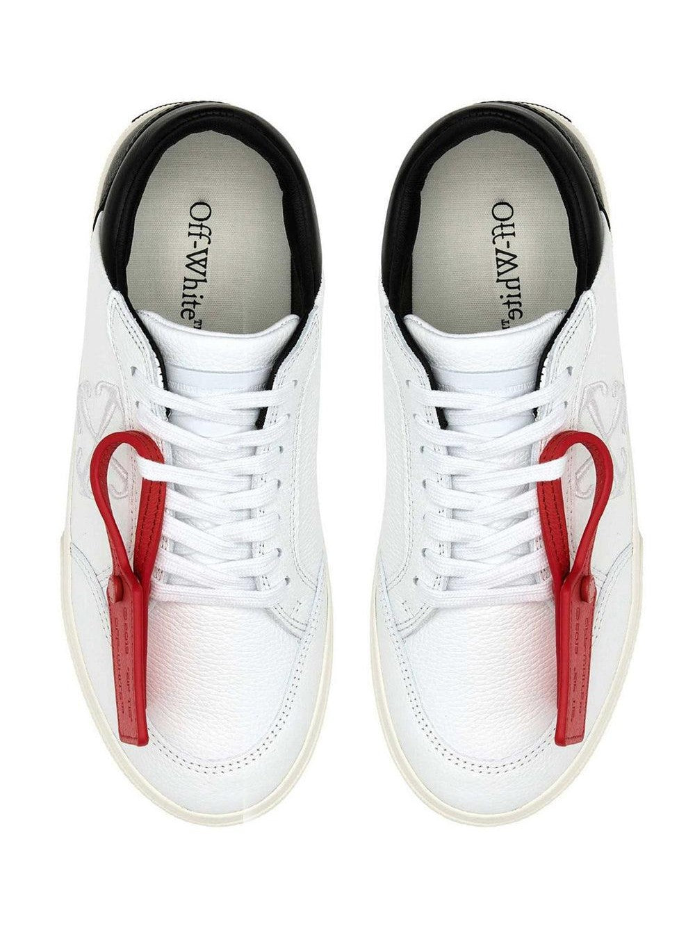 Off-white low-top vulcanized leather snakers