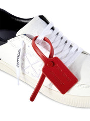 Off-white low-top vulcanized leather snakers
