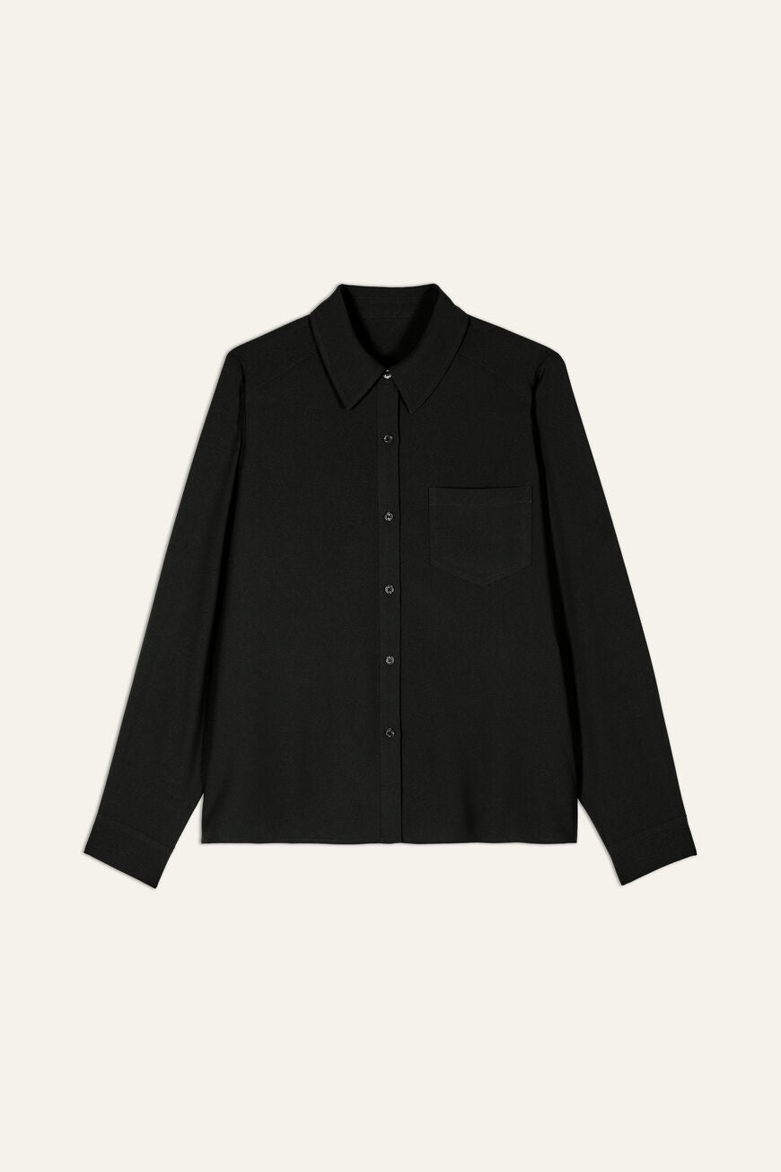 monica. LOOSE BUTTONED SHIRT شيرت 