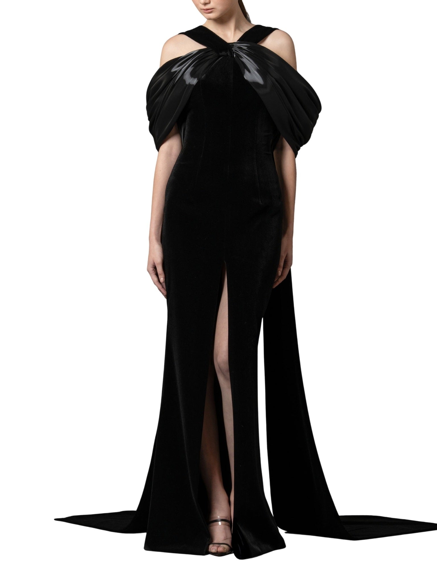 Halter-neck fitted velvet dress featuring a liquid gazar drape