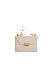 Mahogany cowhide in cream. gold plated brass hardware and alcantara interior with a detachable chain.  h: 12  cm w: 16.4 cm d: 5 cm