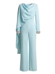 Crep blue jump suit with attached cape and embroidery on sleeve silver