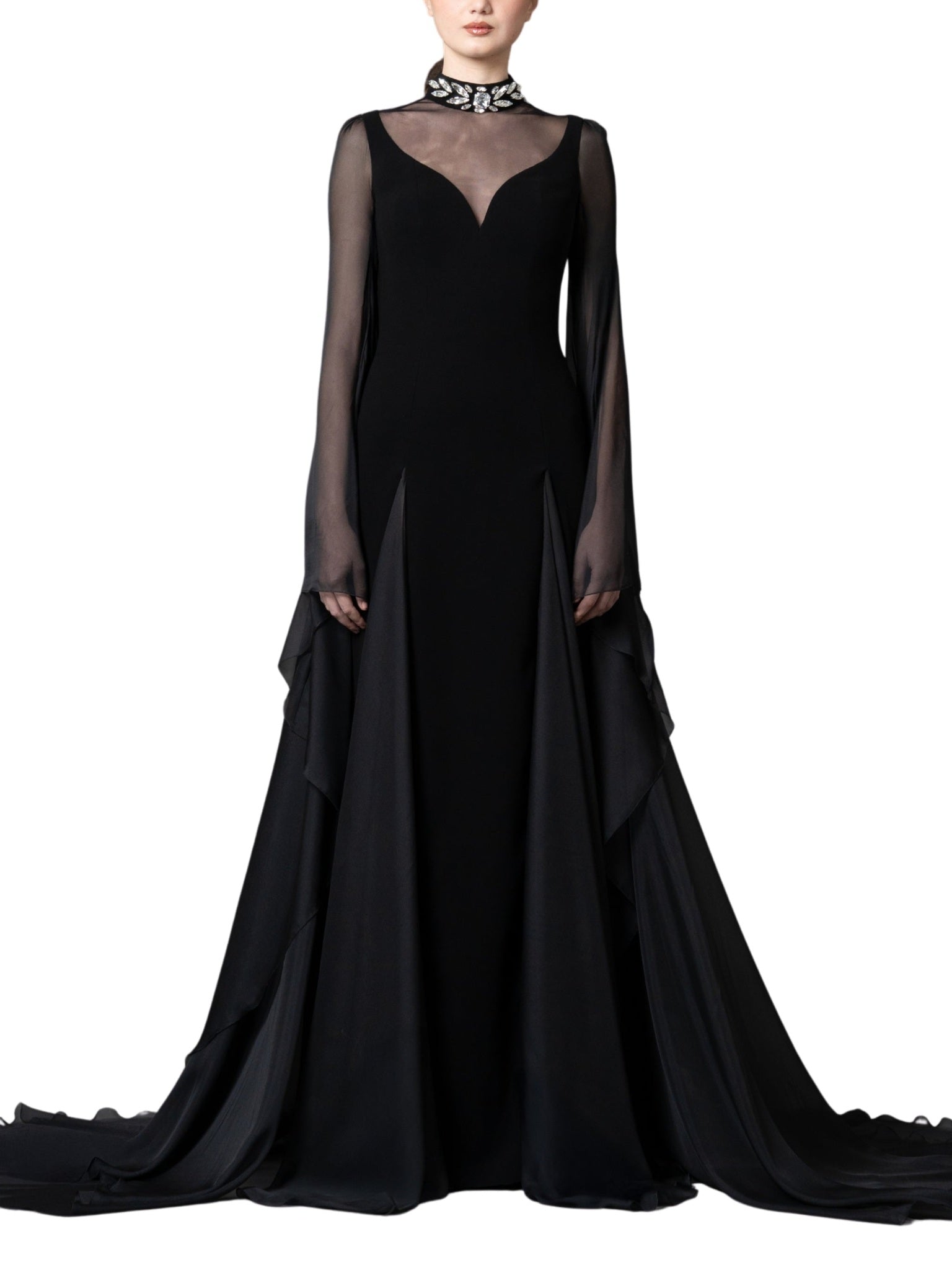 A high-neck gown featuring a crystal-embellished collar and cascading chiffon sleeves with chiffon godets that create a flowing movement.