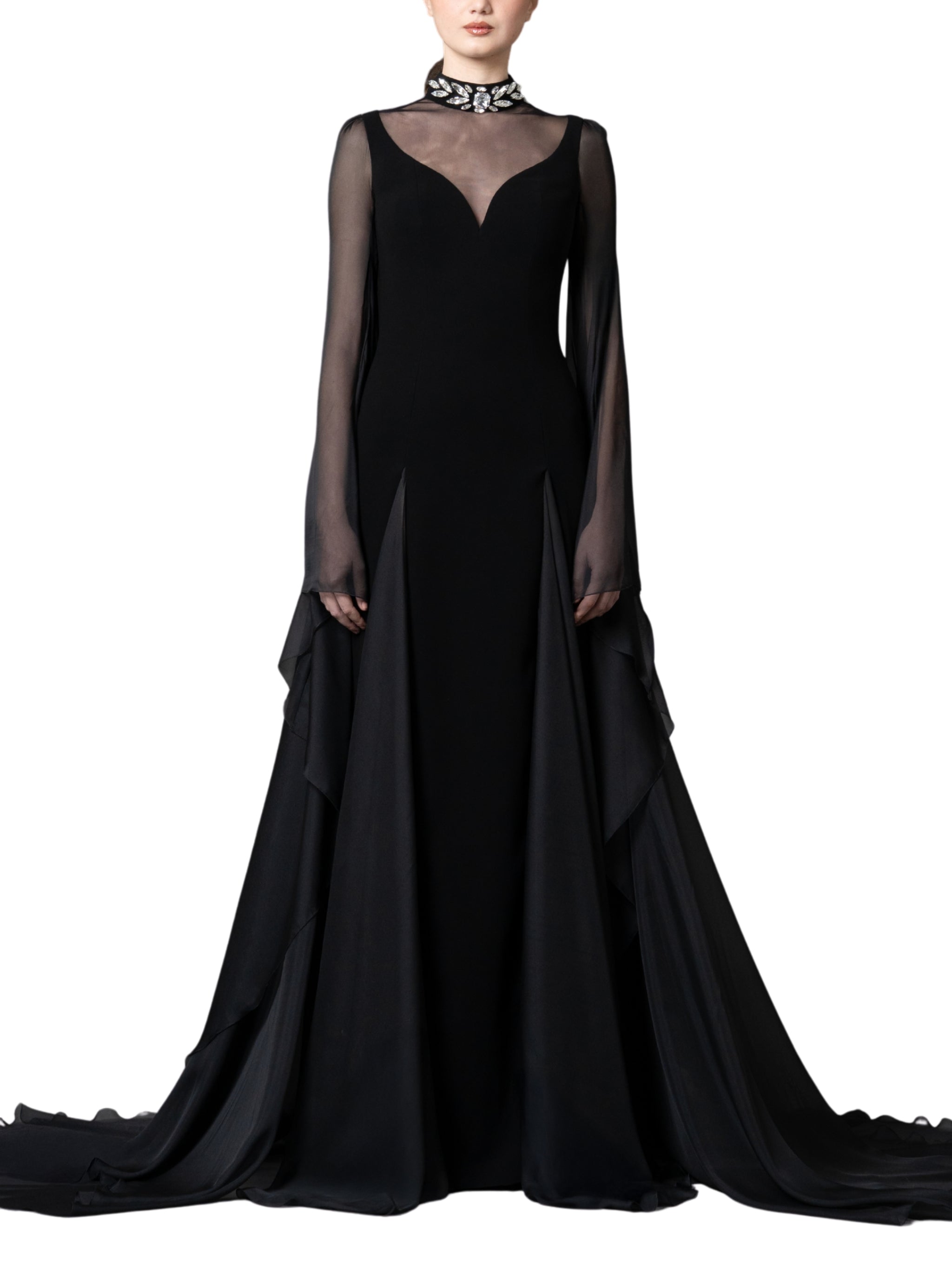 A high-neck gown featuring a crystal-embellished collar and cascading chiffon sleeves with chiffon godets that create a flowing movement.