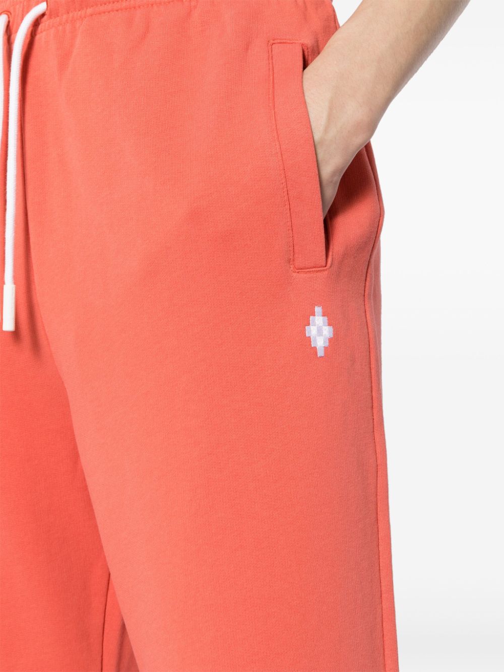 CROSS BAGGY SWEATPANTS BRICK RED WHITE