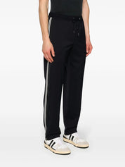 logo-embroidered tapered trousers تراوزرس