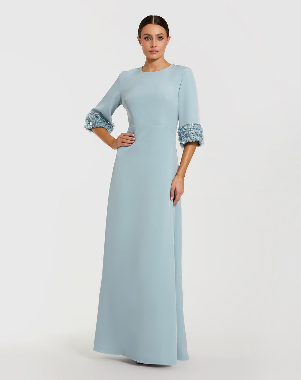 Blue a-line crepe gown with embellished 3/4 sleeves