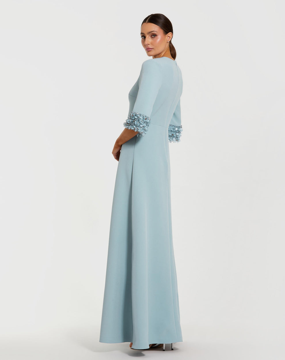 Blue a-line crepe gown with embellished 3/4 sleeves