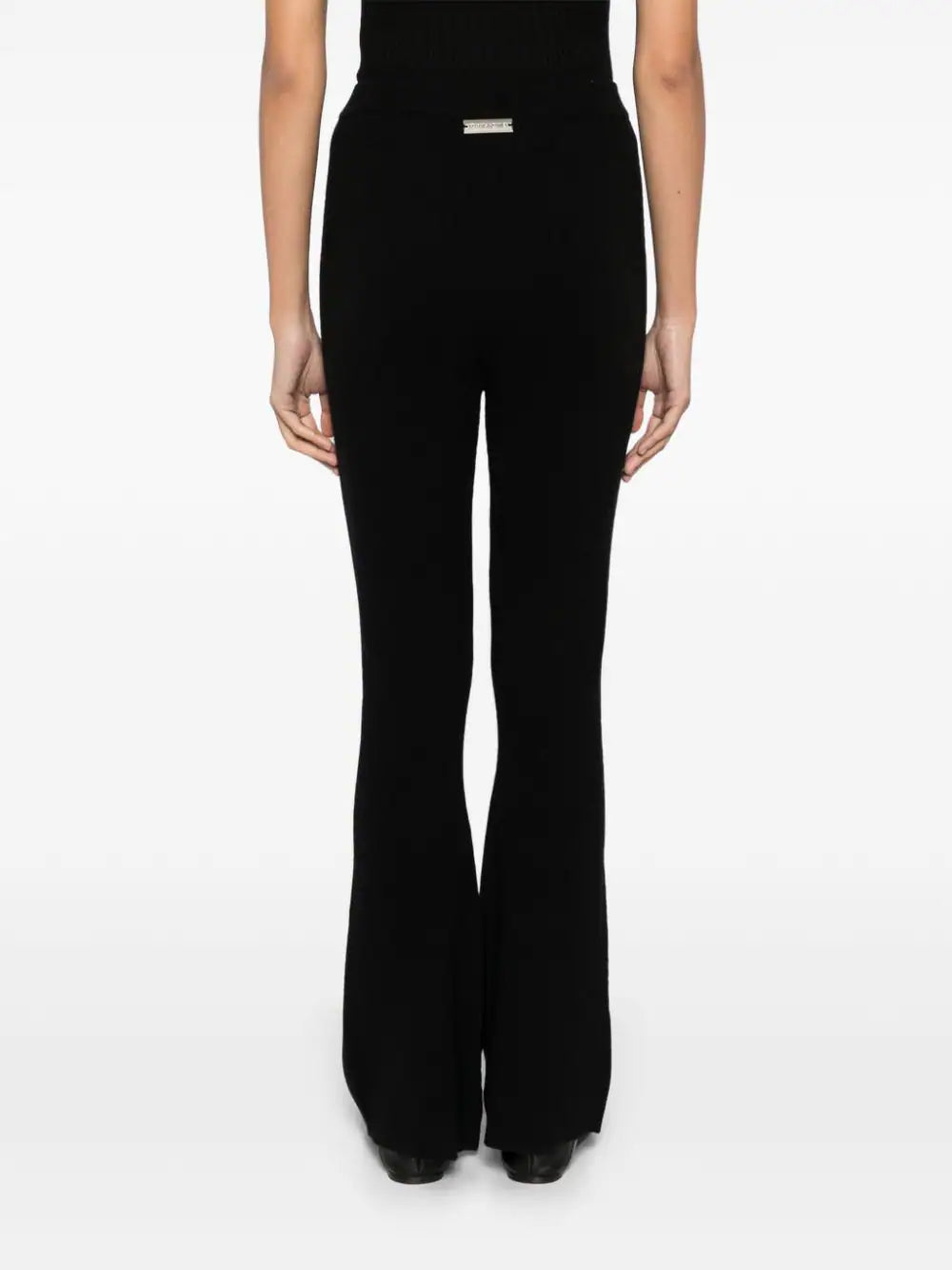 RIBBED FLARED PANTS IN BLACK