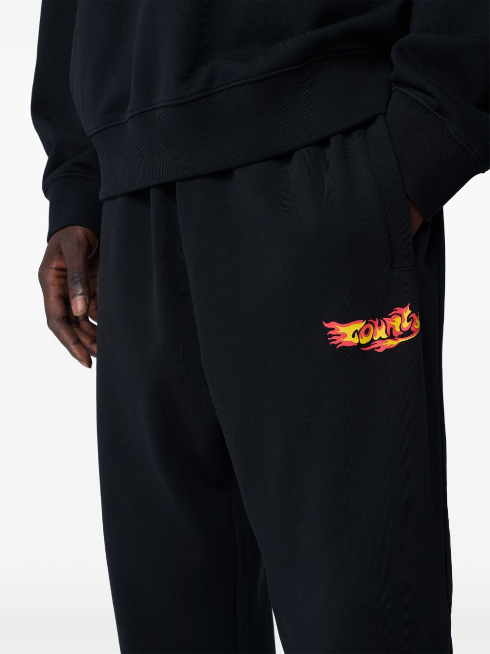 COUNTY FLAME BAGGY SWEATPANTS BLACK RED