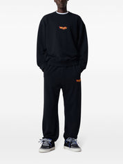 COUNTY FLAME BAGGY SWEATPANTS BLACK RED