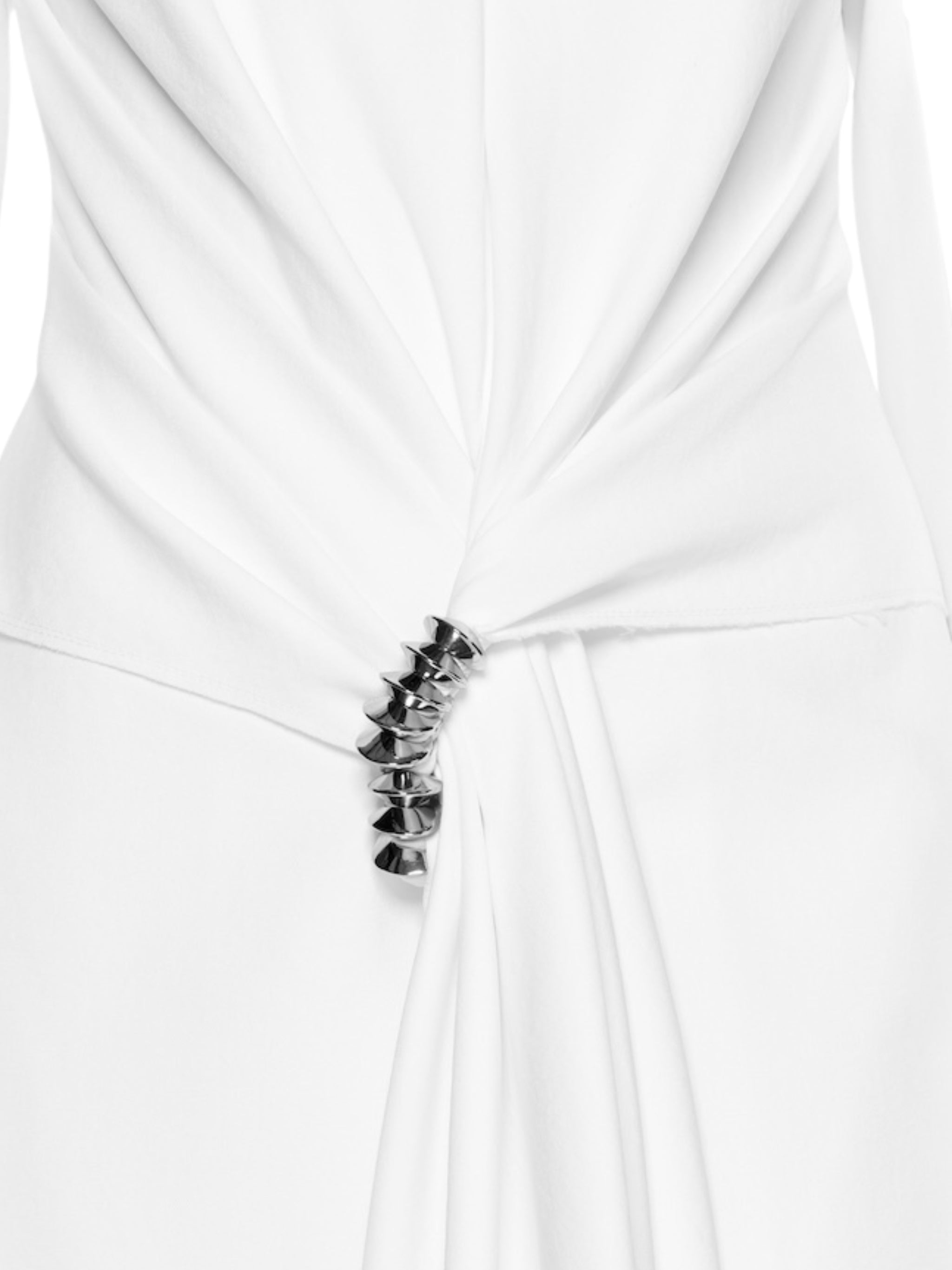 Fitted suit coat featuring front draping accentuated by a premium metal accessory detail