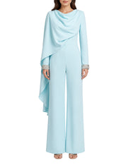 Crep blue jump suit with attached cape and embroidery on sleeve silver