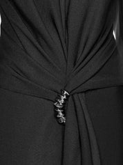 Fitted suit coat featuring front draping accentuated by a premium metal accessory detail