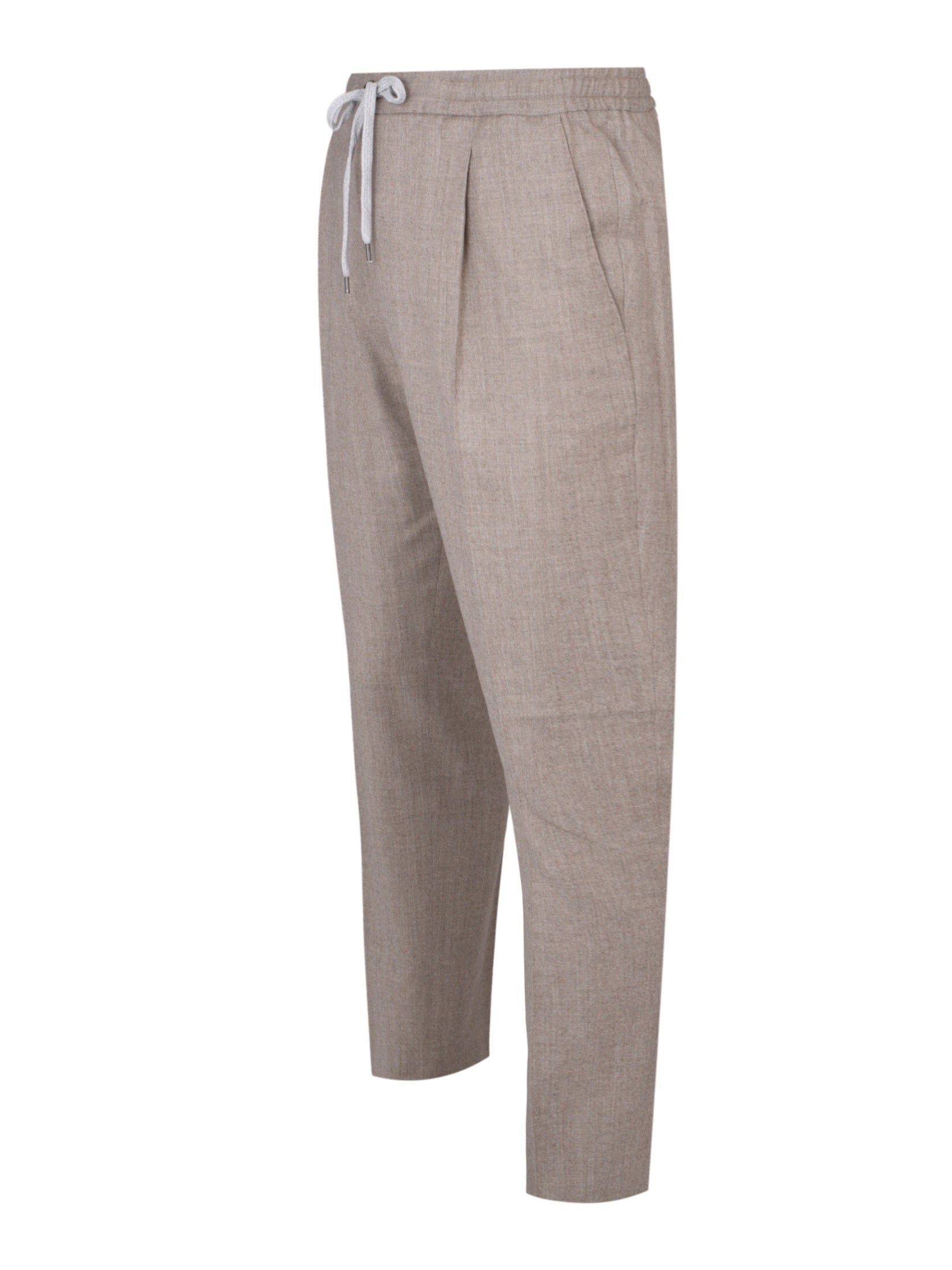 Pantalone soft 1 pleats diagonal pkts zipped back pkts leather det elastic w.band ext drawstr finis b.