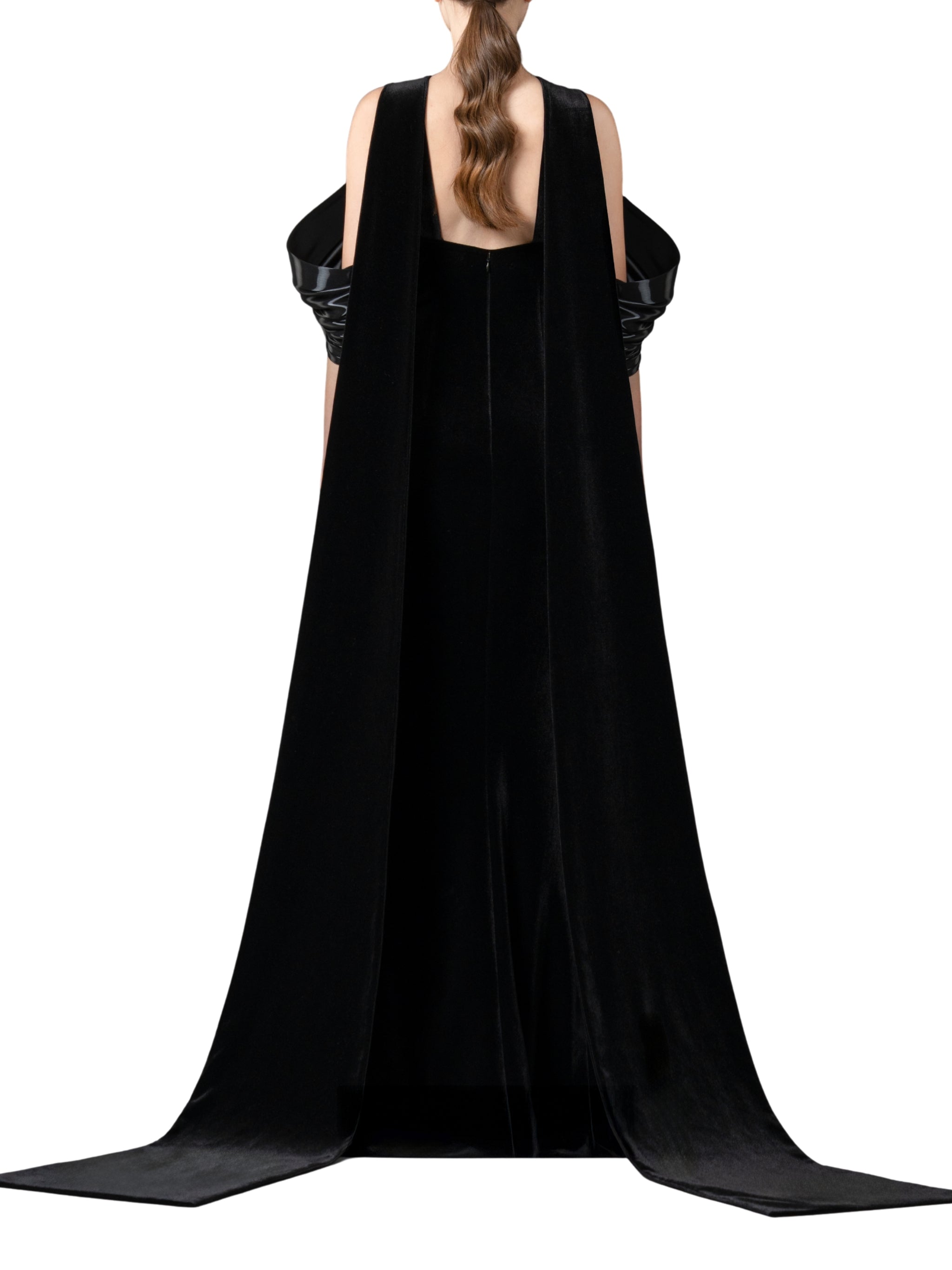 Halter-neck fitted velvet dress featuring a liquid gazar drape