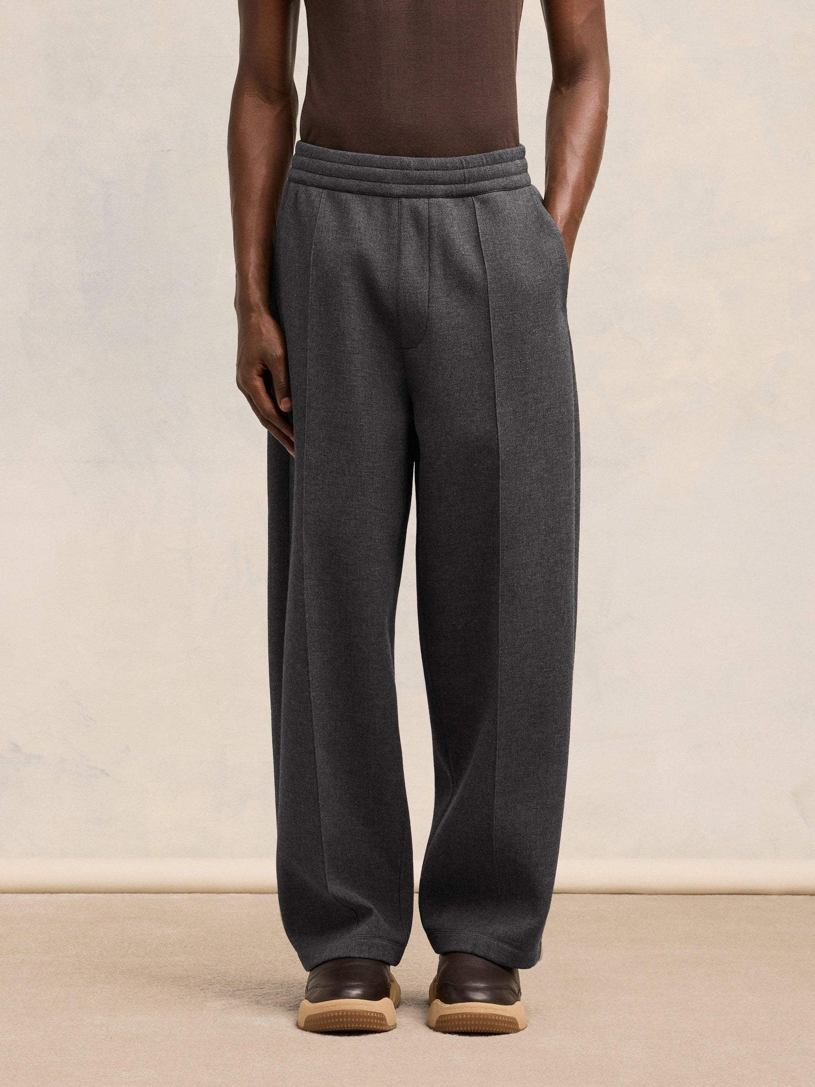 Ami pleated trousers pleated trousers in bonded wool viscose canvas.