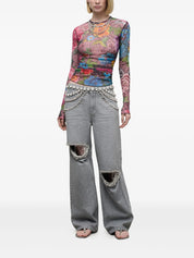 Distressed crystal relaxed slit jean