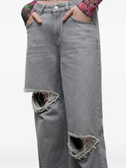 Distressed crystal relaxed slit jean