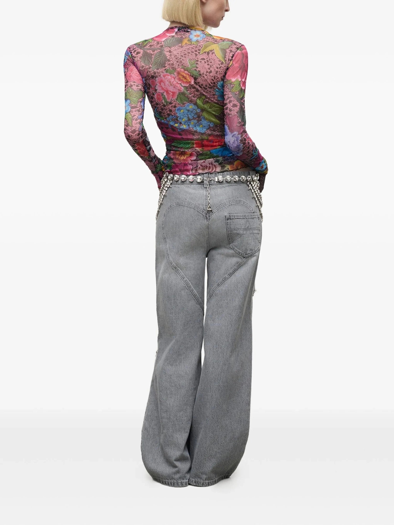 Distressed crystal relaxed slit jean