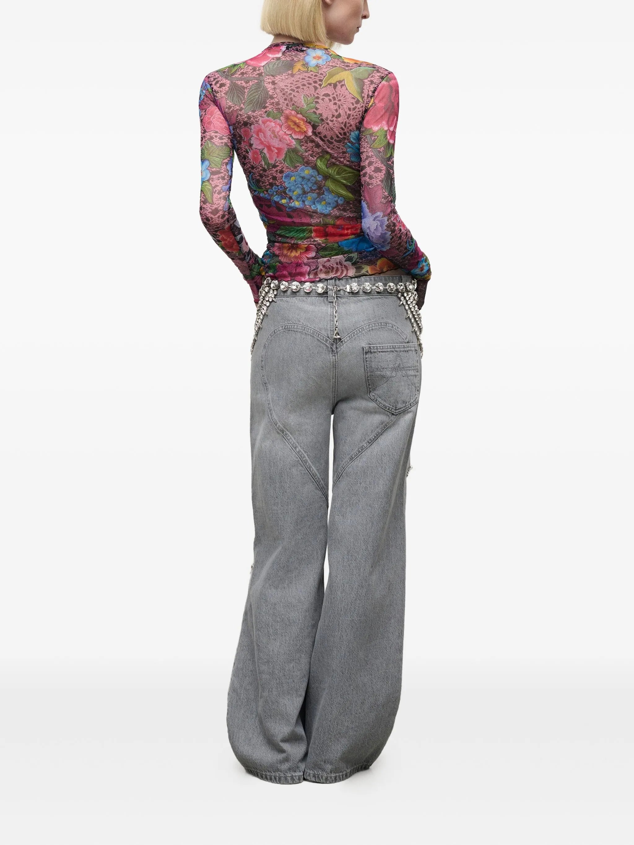 Distressed crystal relaxed slit jean