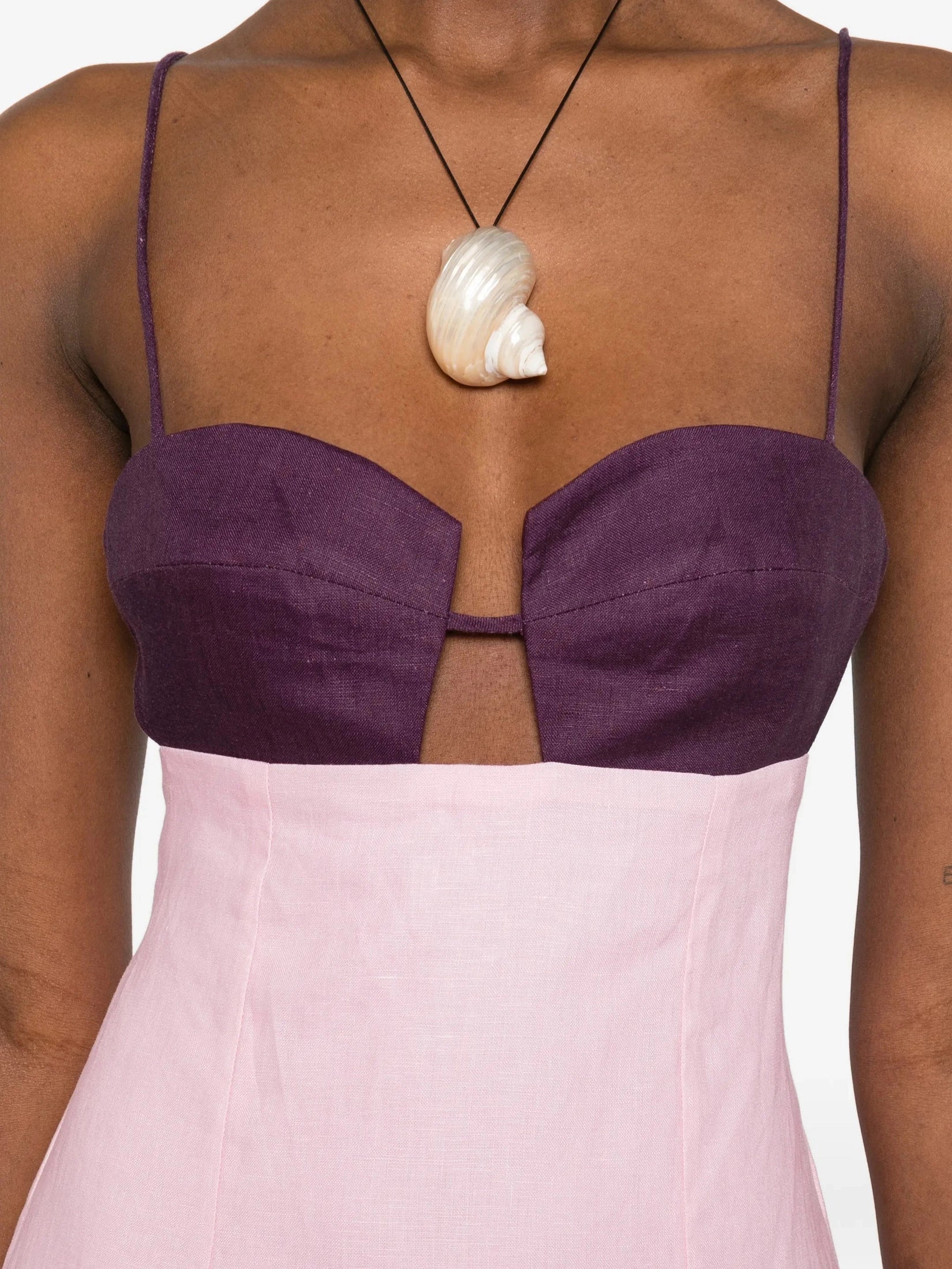 Fitted bodice midi dress featuring a straight skirt and thin straps
