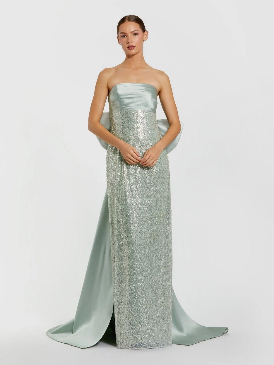 Green strapless embellished gown with back bow detail