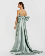 Green strapless embellished gown with back bow detail