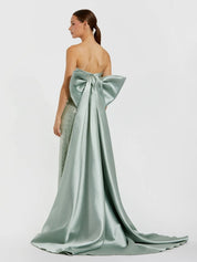 Green strapless embellished gown with back bow detail