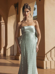 Green strapless embellished gown with back bow detail