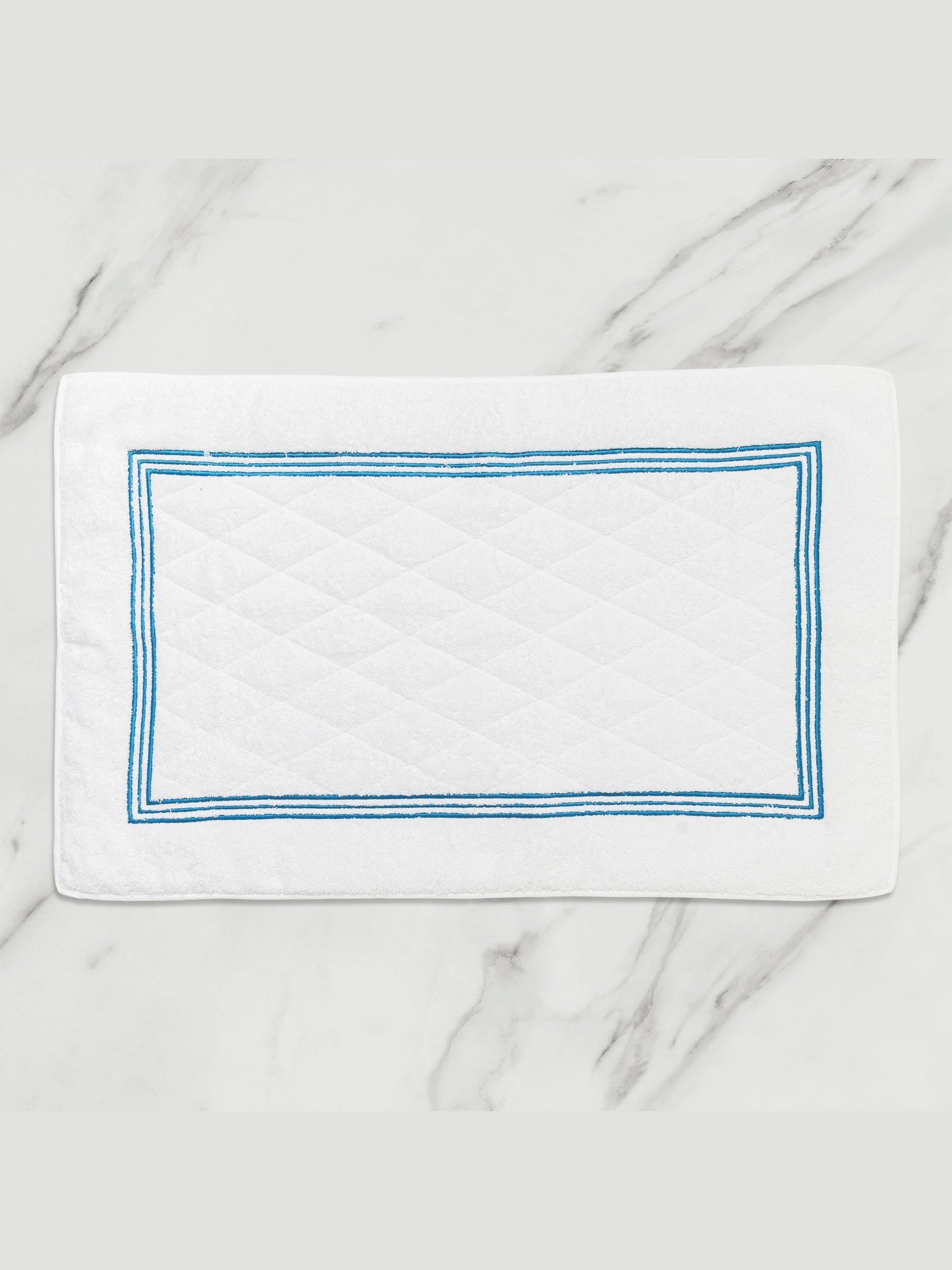 Triplo bourdon bath mat