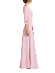 Sharp boat neck gown with asymmetric godets