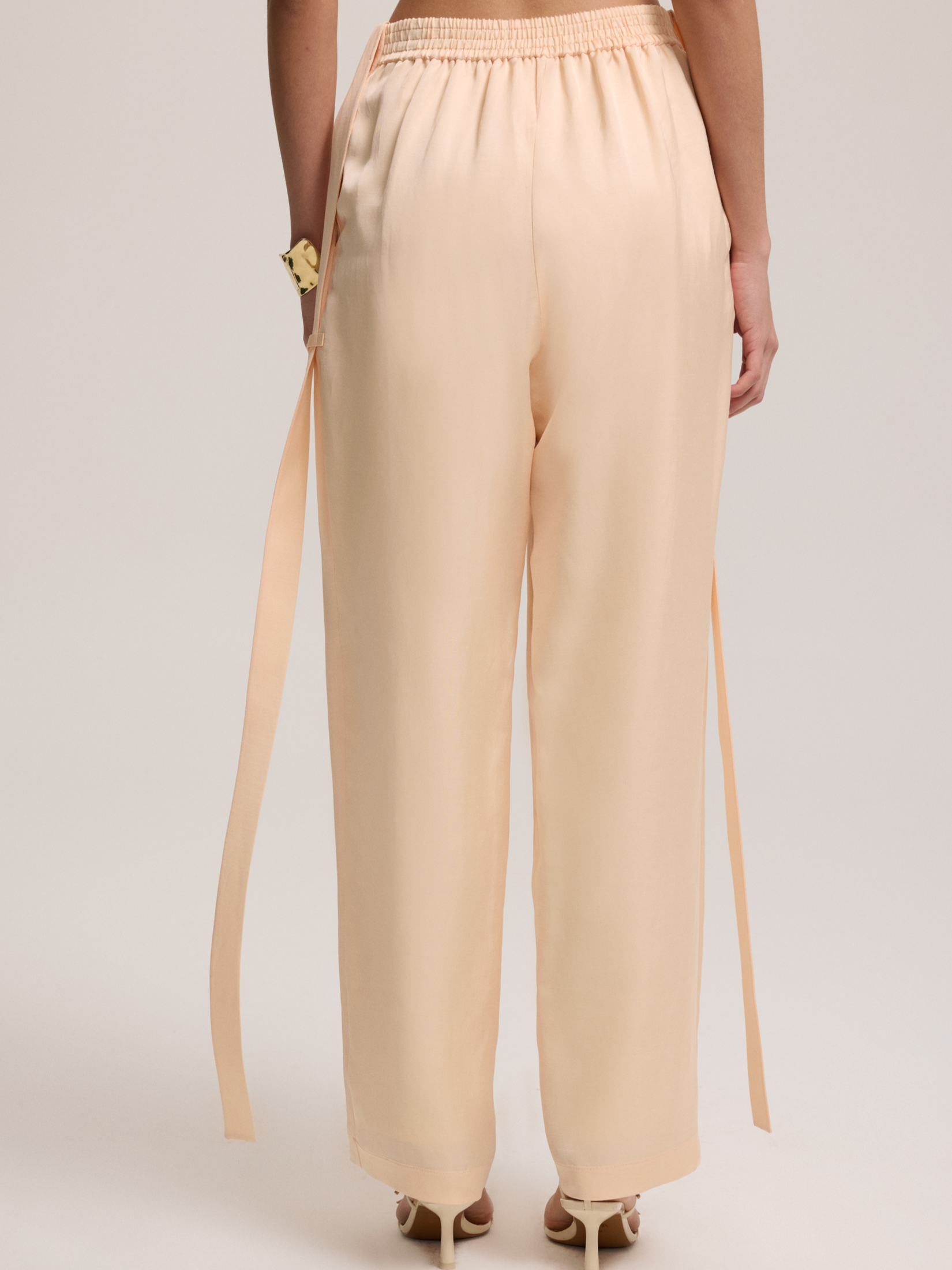 Salmon colored trousers