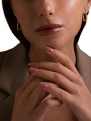Nail lock earrings in sterling silver & 18k gold vermeil and peachy enamel