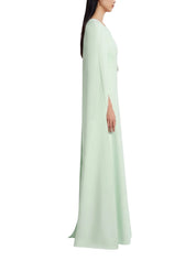 Full-length fitted cape gown with an a-line skirt