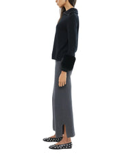 THE ZIP UP FAUX CUFF SWEATER IN BLACK