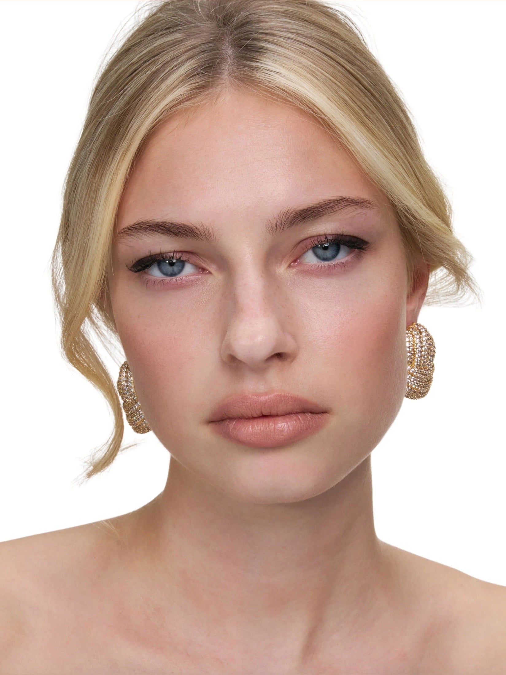 Gold crystal knot earrings