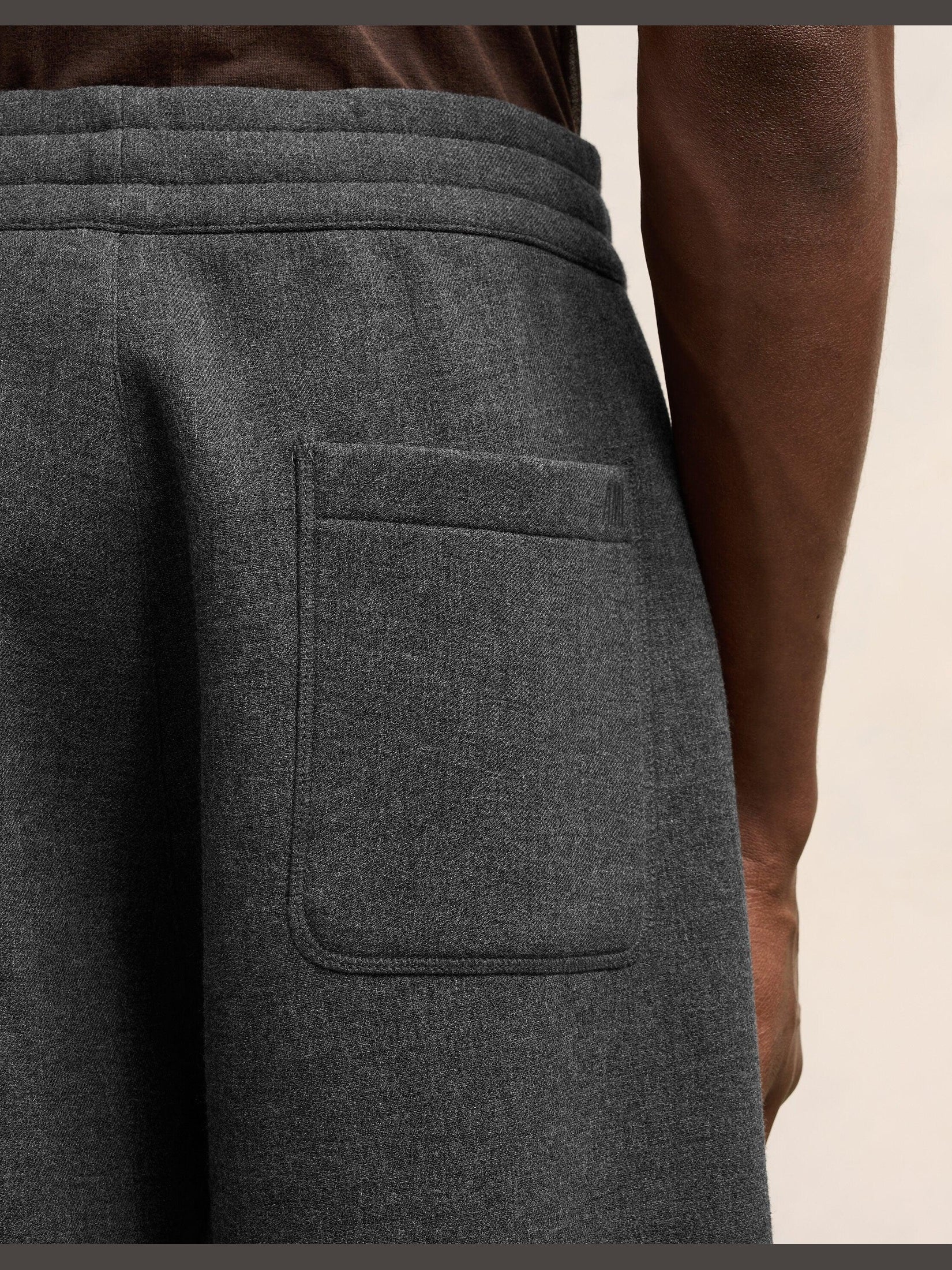 Ami pleated trousers pleated trousers in bonded wool viscose canvas.