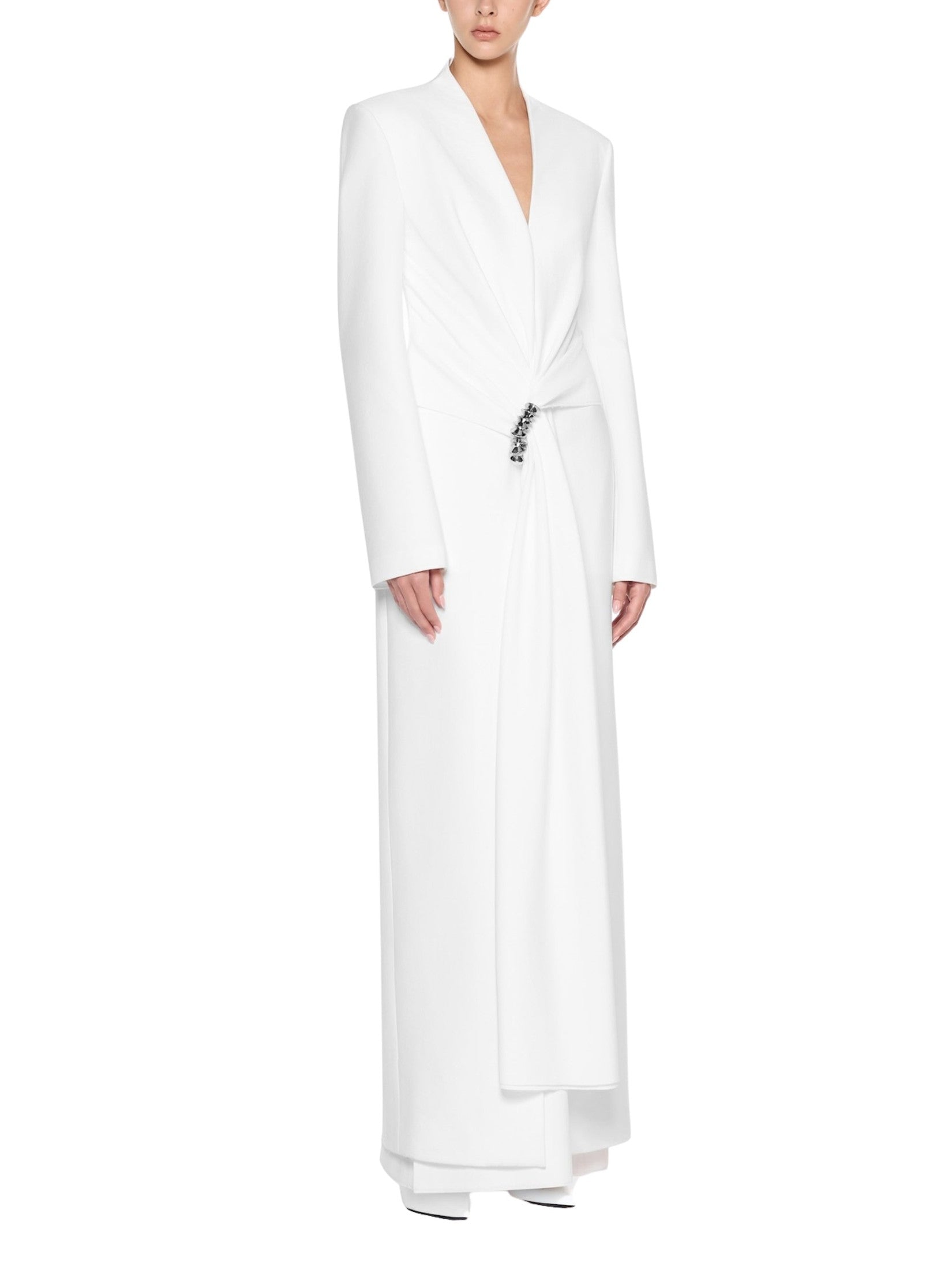 Fitted suit coat featuring front draping accentuated by a premium metal accessory detail