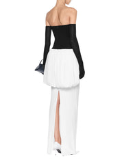Strapless long dress featuring voluminous draping at the hips