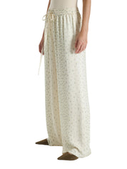 CREAM PATTERNED PALAZZO TROUSERS