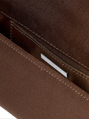 Malika stone-encrusted hotfix baguette clutch