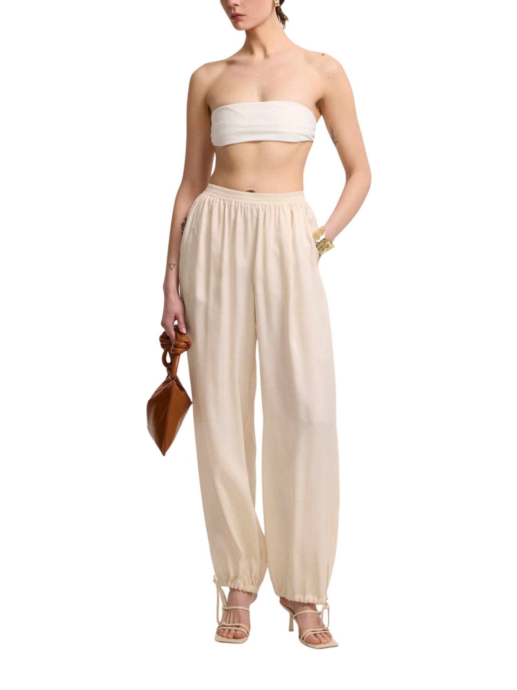 Light beige trousers with drawstring legs