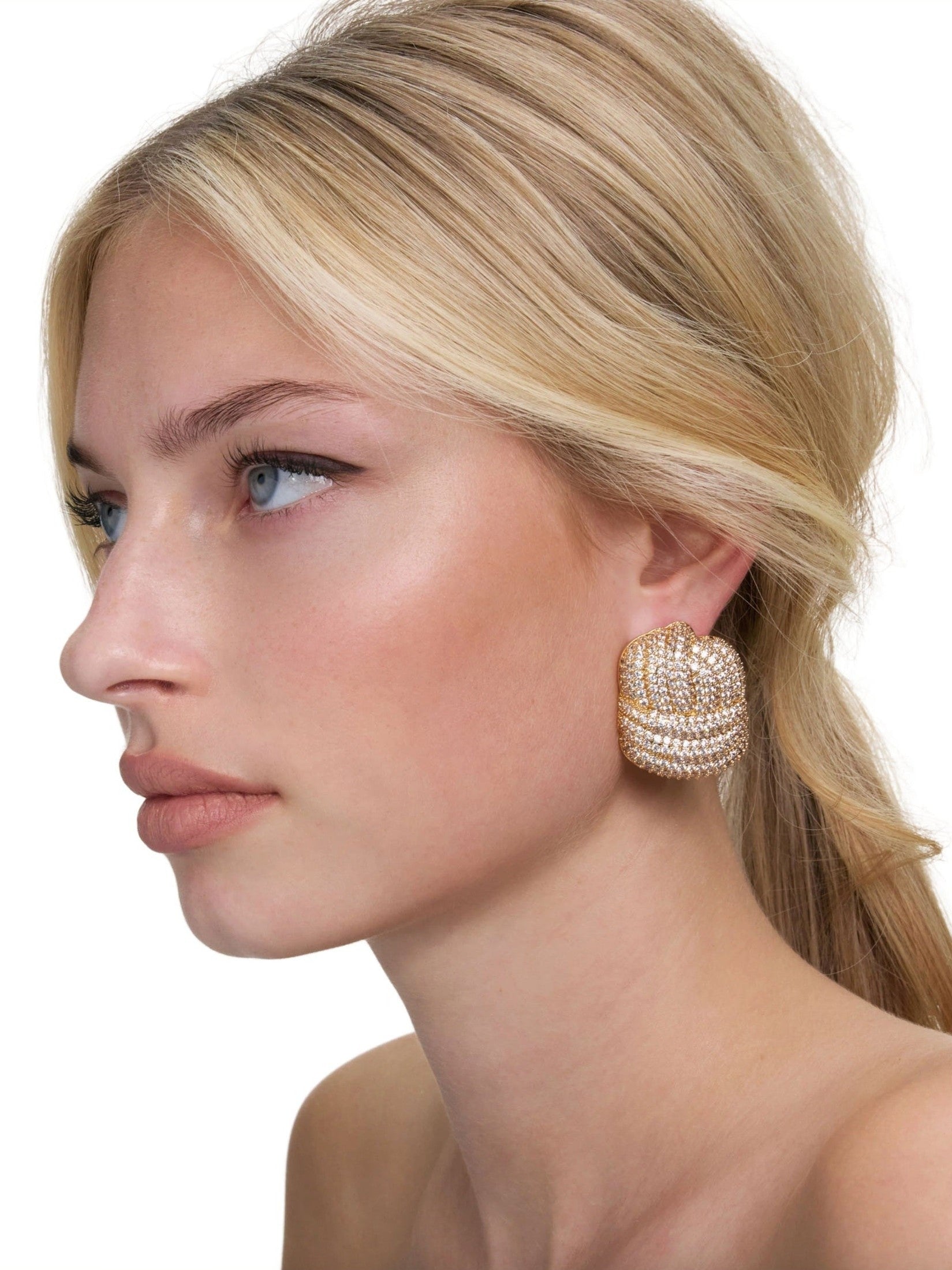 Gold crystal knot earrings