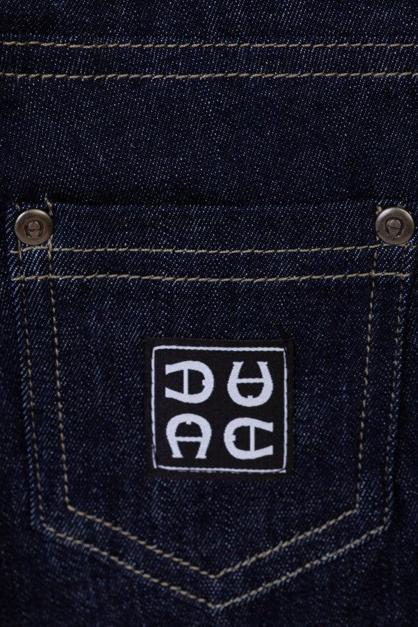 BERMUDAS STRETCH DENIM WOVEN BADGE