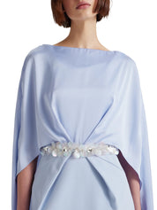 Column gown with deep pleats and elegant cape