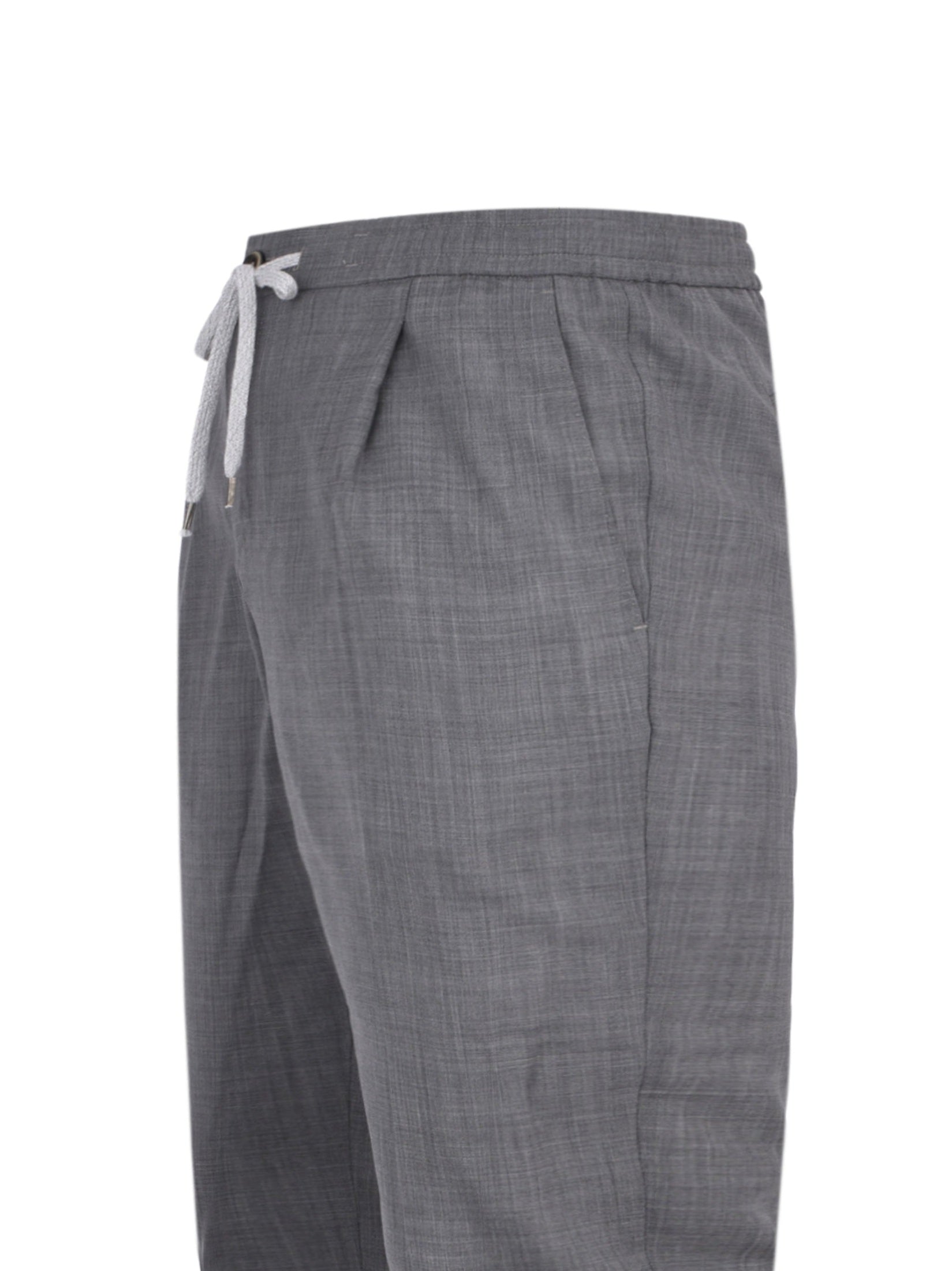 Pantalone soft 1 pleats diagonal pkts zipped back pkts leather det elastic w.band external drawstring