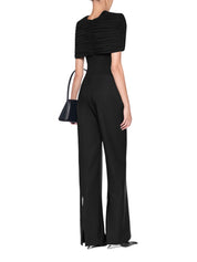 Low-rise flared trousers with a back slit accented with a metal accessory