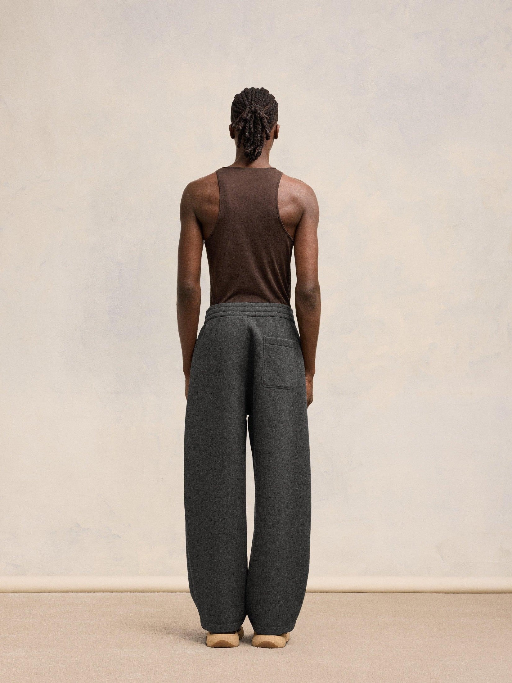 Ami pleated trousers pleated trousers in bonded wool viscose canvas.